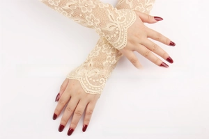 Detailed close-up of beige floral lace UV protection arm sleeves for summer driving