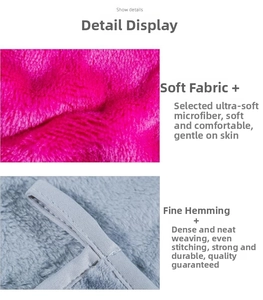Detail view of pink microfiber makeup remover cloth with high-density fibers and grey edging