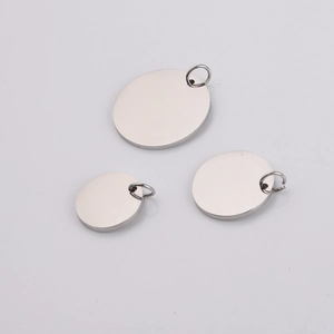 Three circular polished stainless steel pendants in varying sizes with small hanging rings