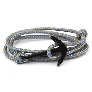 Gray nautical paracord bracelet with navy blue accents and a black metal anchor clasp
