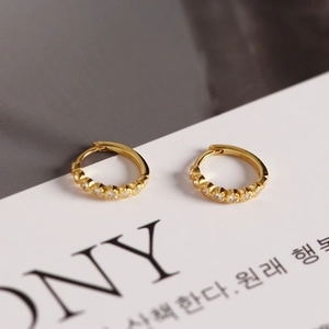 Detailed view of S925 sterling silver gold plated hoop earrings with zircon stones