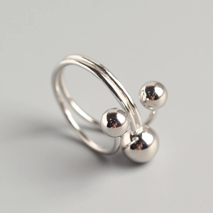 Minimalist 925 silver cross ring featuring three polished metal beads on an open band