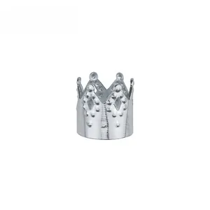 Close-up of a silver crown-shaped hair charm with hollow embossed details for dreadlocks