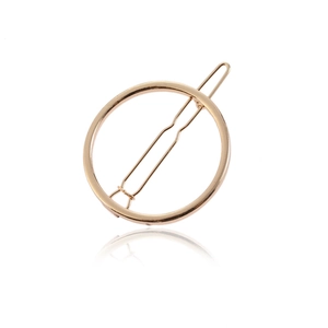 Barrette à cheveux circulaire minimaliste en métal doré avec finition lisse et ressort