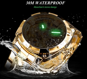 Macro shot of gold skeleton mechanical watch submerged in water showing 30M waterproof feature