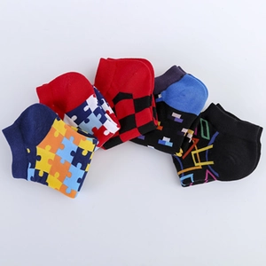 Five pairs of trendy men's cotton low cut socks with colorful geometric patterns
