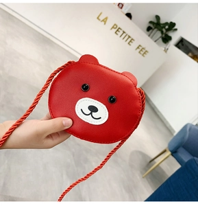Detail of red cartoon bear mini crossbody bag for kids with durable PU leather and braided strap
