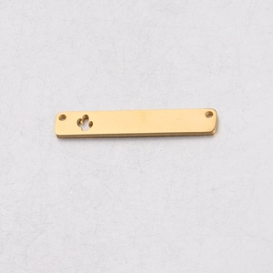 Detail of gold rectangle cactus cutout pendant with double holes in stainless steel