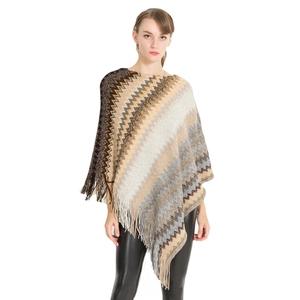 Women's autumn knit poncho with brown and grey striped pattern and fringed edges