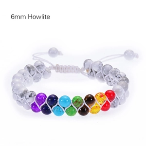Macro shot of 6mm howlite and seven chakra beads in a double-layer woven bracelet