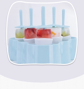 Blue silicone mini popsicle mold set with base showing fresh fruit ice lollies details