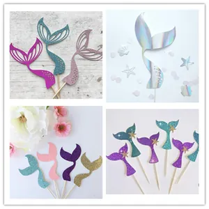 Glittery mermaid tail cake toppers in vibrant laser colors for party dessert decoration