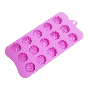Detailed view of purple 15-cavity silicone mold with rose and daisy floral shapes