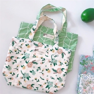 Floral cotton canvas handbag with zipper and top handles in various artistic patterns