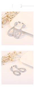 Detail of silver teardrop earrings with micro-pave setting and hollow oval design