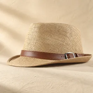 Classic summer straw fedora in light khaki with brown leather belt and silver buckle detail