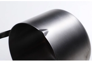 Detailed macro view of high-quality stainless steel cup rim and brushed metal texture