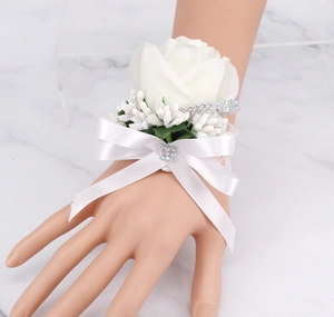 Elegant white artificial rose wrist corsage with silk ribbon and sparkling diamond accents