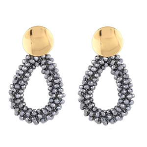 Détails de boucles d'oreilles en perles de cristal en goutte avec disque doré poli