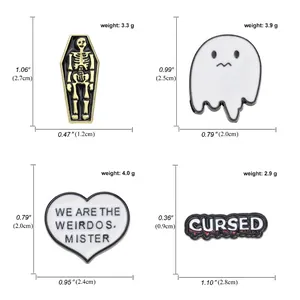 Size guide for horror enamel pins including skull coffin, ghost and gothic text badges