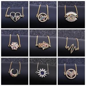 Macro detail of nine assorted micro-paved zircon bracelets in gold and silver finishes