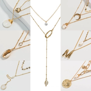 Detailed view of layered gold necklaces with pearl, shell, and crescent moon charms