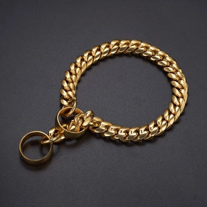 Close-up view of 14mm gold-colored cuban link pet dog training collar chain with metal rings.