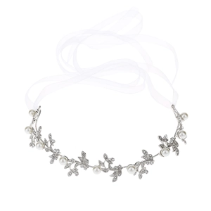 Silver leaf bridal headband with pearls and rhinestones on white studio background