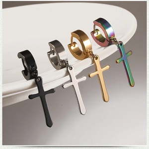Detailed view of stainless steel cross drop earrings in black, silver, gold, and rainbow