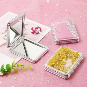 Portable folding makeup mirror with glitter quicksand and square silver frame design