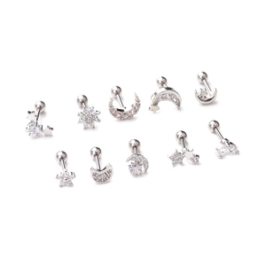 Minimalist silver stud earring set with zircons featuring star moon and snowflake designs