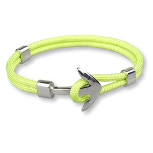 Detail of yellow-green polyester braided bracelet with a polished silver anchor clasp