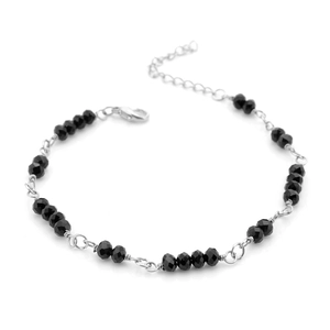 Detailed view of black faceted crystal beads on silver titanium steel chain with lobster clasp
