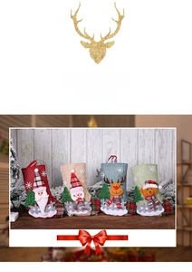 Detail of four Christmas stockings with 3D Santa, Snowman, Reindeer and Bear motifs