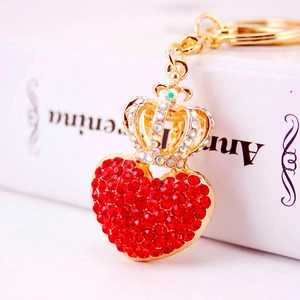 Golden crown and red crystal heart keychain accessory for handbags and wallets