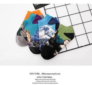 Detail view of cotton boat socks featuring Van Gogh and Da Vinci famous art prints
