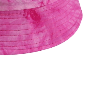 Detailed close-up of a pink tie-dye bucket hat showing reinforced stitching details
