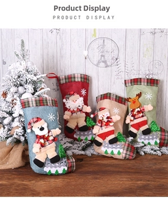 Detail of 3D Christmas stockings featuring Santa, reindeer, snowman, and polar bear designs
