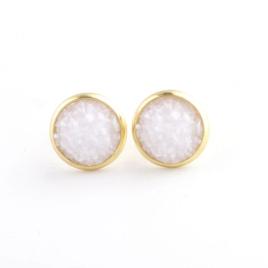 Detailed view of 10mm gold-plated stainless steel stud earrings with white druzy stones