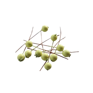 Artificial pale yellow-green blueberry berries with brown stems for home and wedding decor