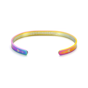 Close-up detail of rainbow iridescent cuff bracelet with 'Best Bitches' text engraving