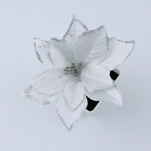 Macro shot of silver glitter poinsettia artificial flower for Christmas tree decoration