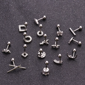 Surgical steel stud earrings set with butterfly and moon shapes and white zircon inlays