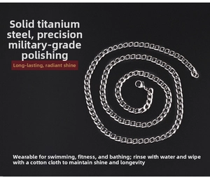 Detail of solid silver titanium steel cuban link chain with high-polished texture