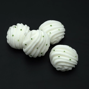 Set of 4 PU slow rebound flower roll bun charms with green dots and key rings