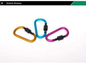 Detailed view of D-ring aluminum carabiners with locking screw in gold, blue and magenta