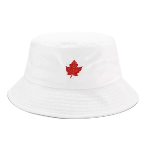 Detailed view of red maple leaf embroidery on white cotton fisherman bucket hat
