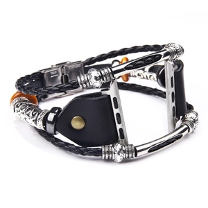 Detailed view of woven black leather smartwatch strap with silver metal tubes and beads