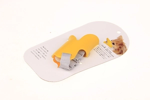Detailed view of yellow duck-shaped silicone muzzle with adjustable nylon strap in size S