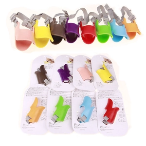 Silicone duck mouth dog muzzle in eight colors with adjustable nylon straps and packaging